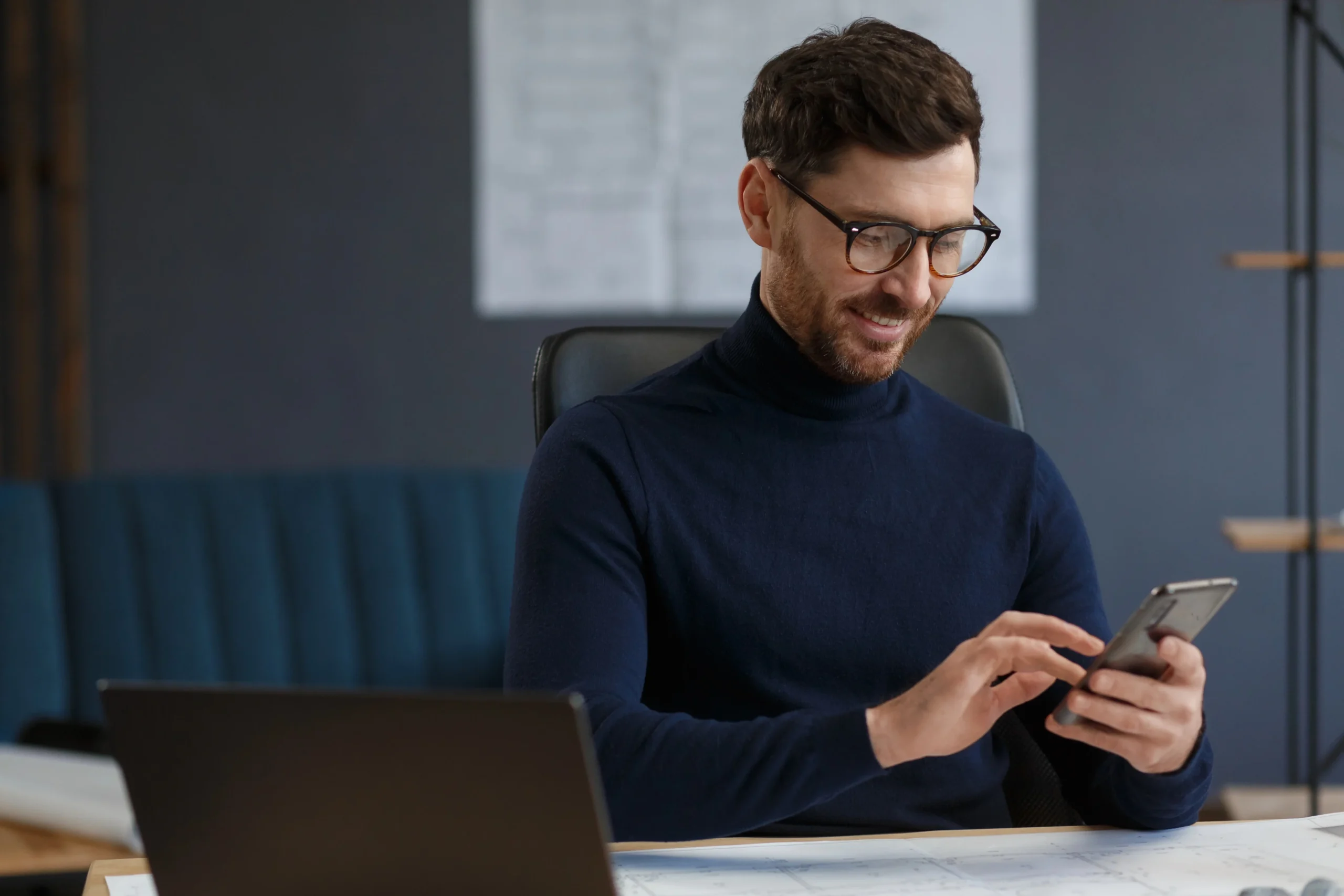 Investor Reading Ttgi Investor Relations Updates And Company Information On A Phoneinvestor Reading Ttgi Investor Relations Updates And Company Information On A Phone