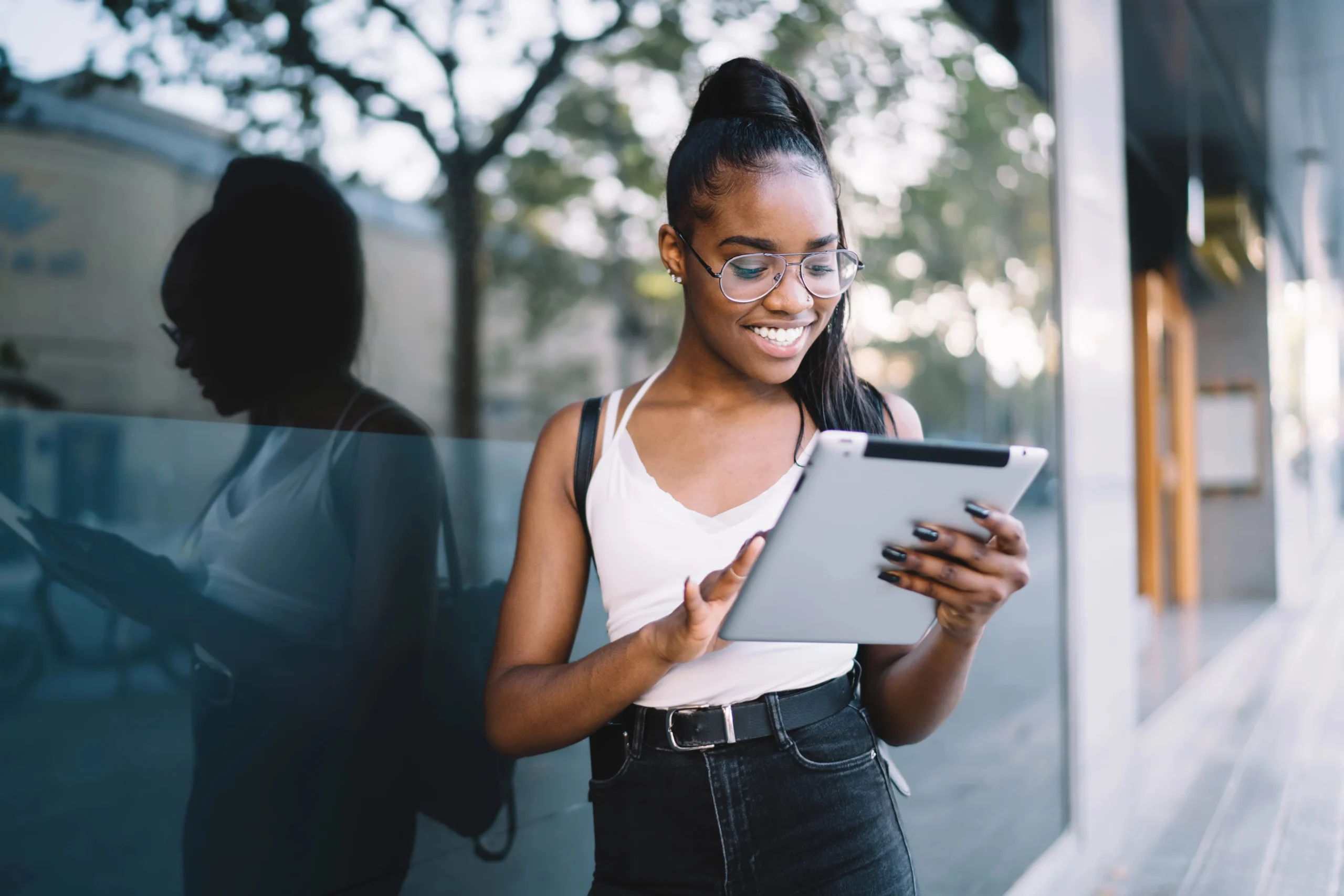 Woman Reviewing Ttgi Press Release Announcements On A Tablet